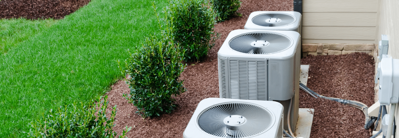 3 outdoor condensers in landscape